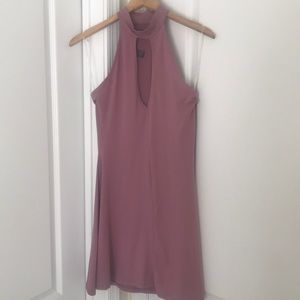 Pink fitted jumper dress.